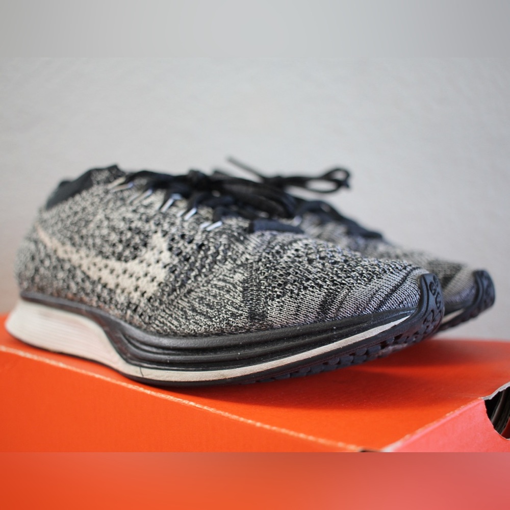 Nike Flyknit Racer in Black/White